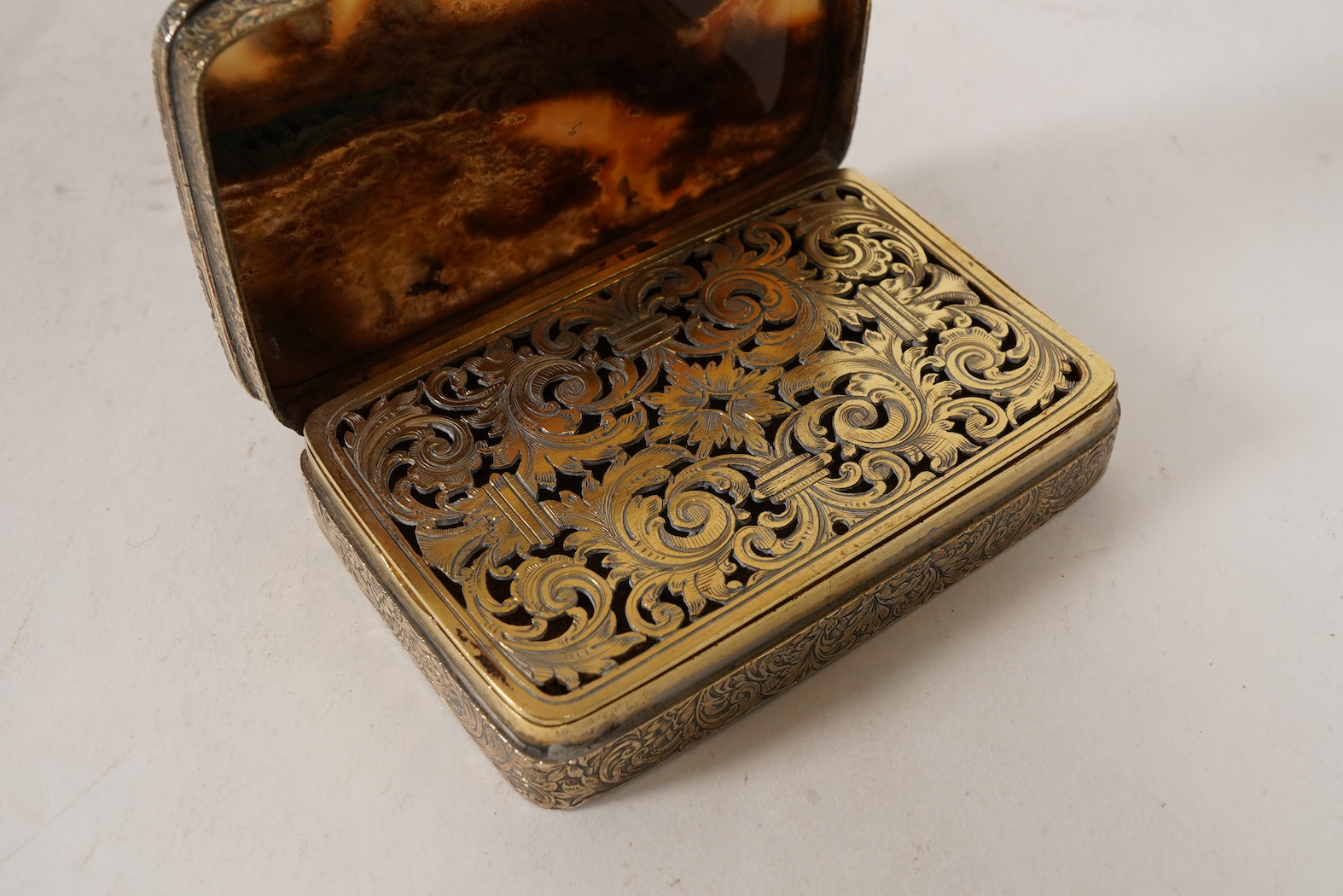A Victorian large silver gilt vinaigrette with inset agate hinged cover, by John Harris